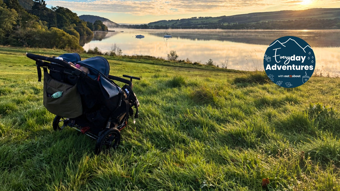Nipper Double V6 buggy on grass beside a lake in golden sunlight, with the Everyday Adventures campaign badge.