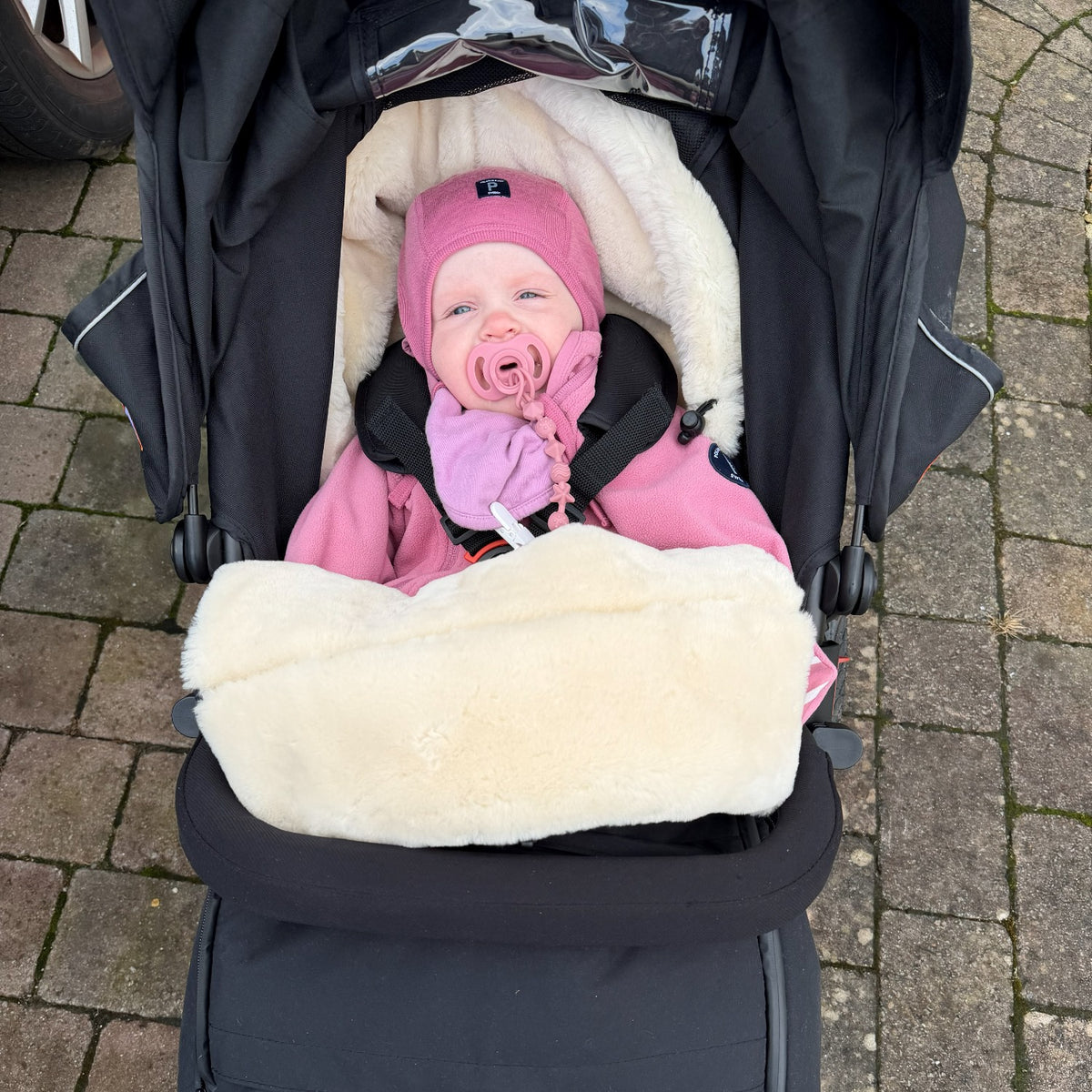 Lifestyle baby in a summit edition footmuff
