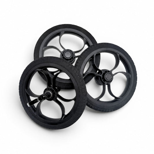 Three 12 inch ETPU Magic Wheels Wheels with multi-spoke rims and treaded tires, arranged on a clean white background